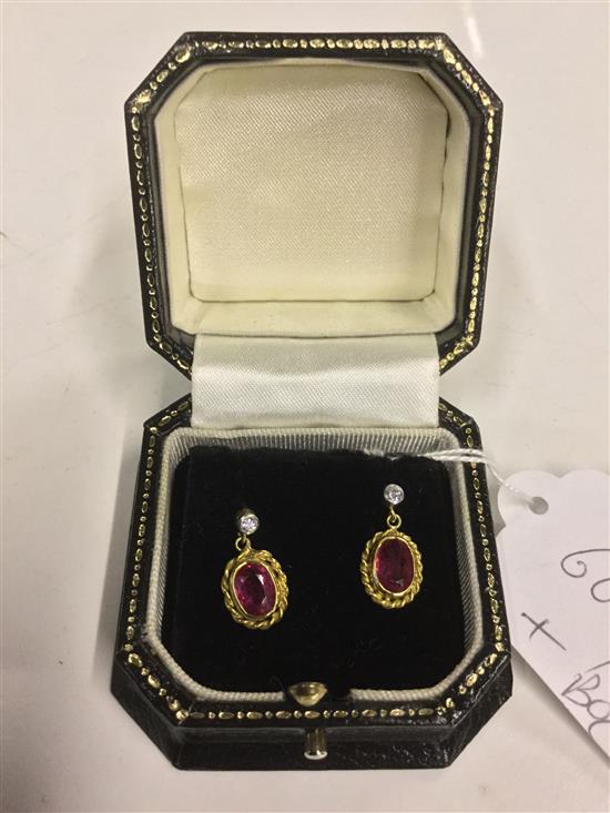 A pair of 18ct gold, ruby and diamond set drop earrings,